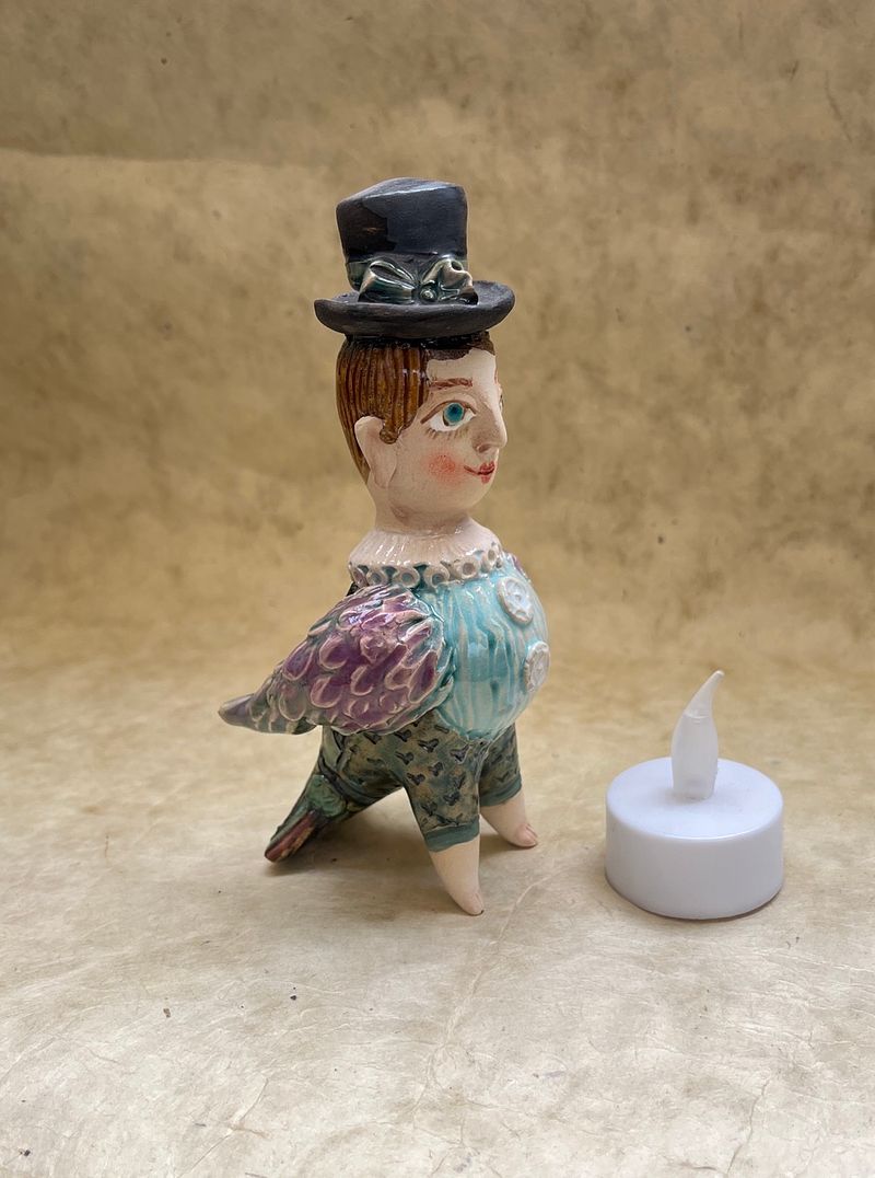 Spring bird with hat, ceramic mini-sculpture