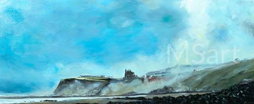 Whitby headland emerging from mist and sea fret