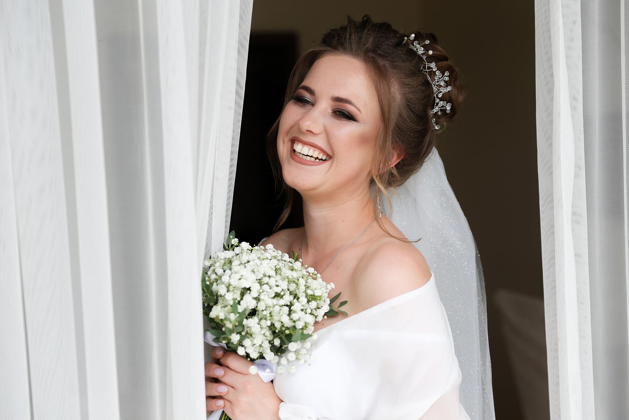Bridal portrait by the window