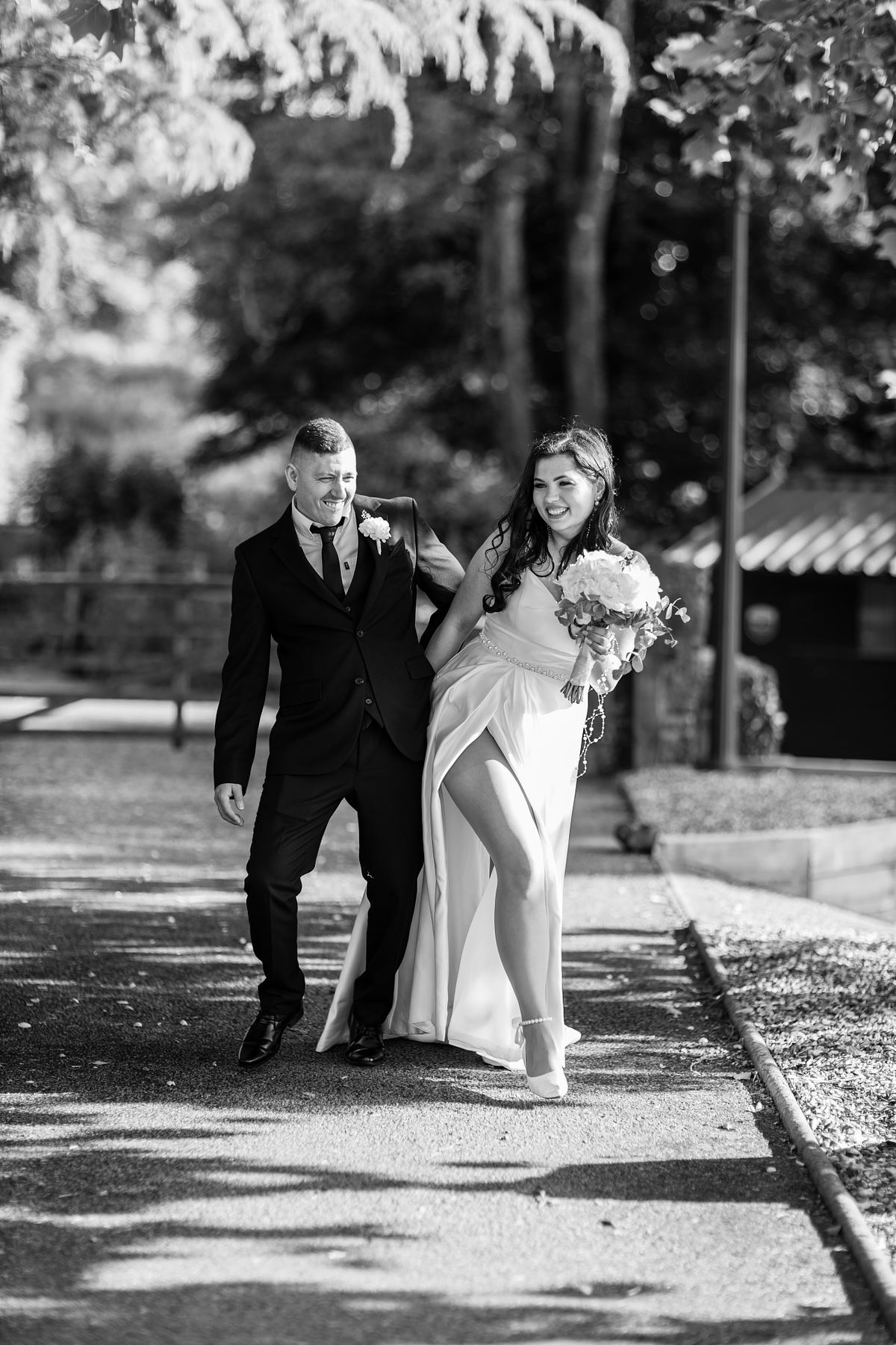 Black and white newlywed portrait outside Pontypool Register Office, South Wales