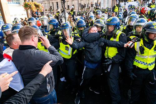 Violent clashes at “Unite the Kingdom” march, London, UK