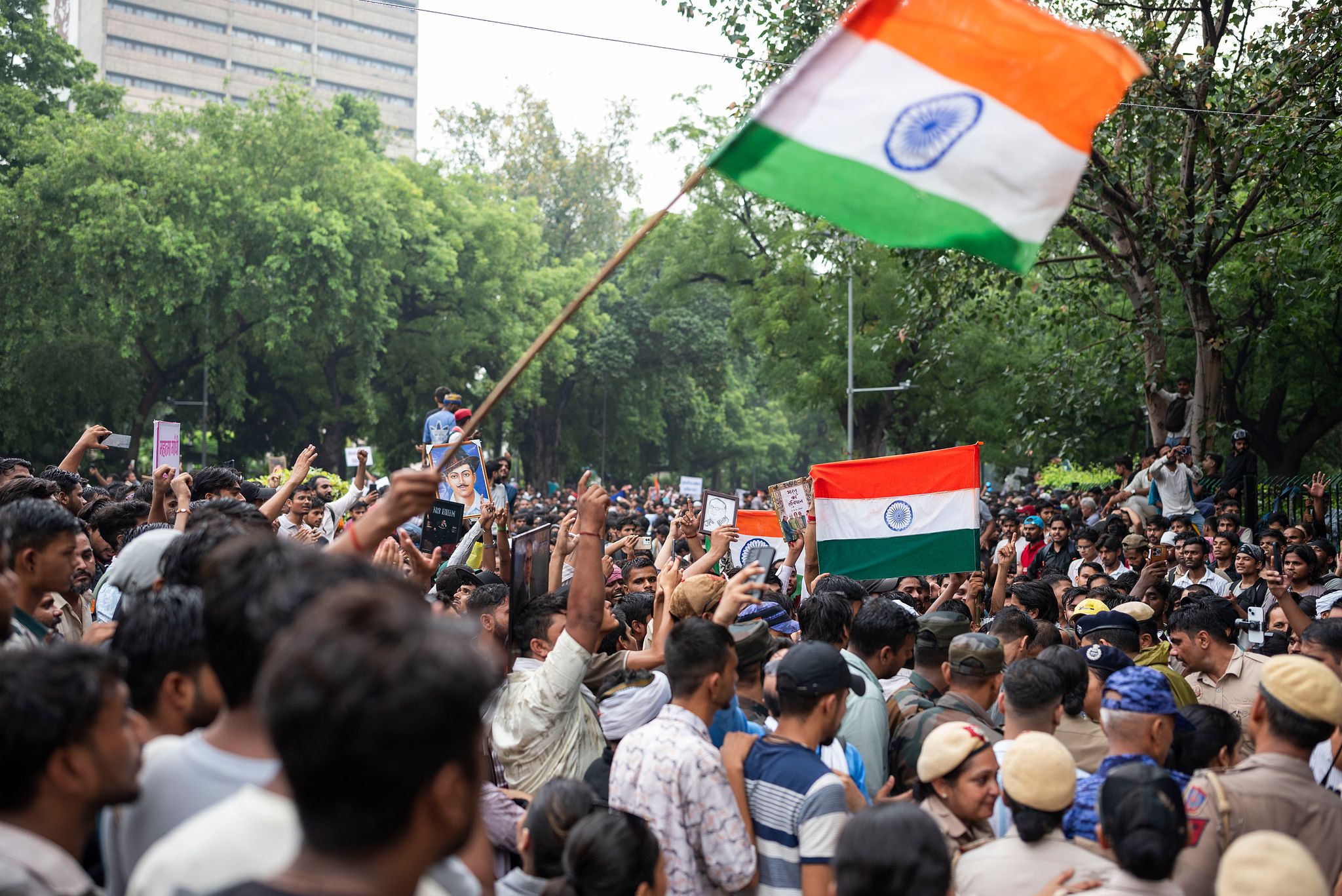 Supporters of India's Cockroach Janta Party (CJP) gather before a march to Parliament in New Delhi