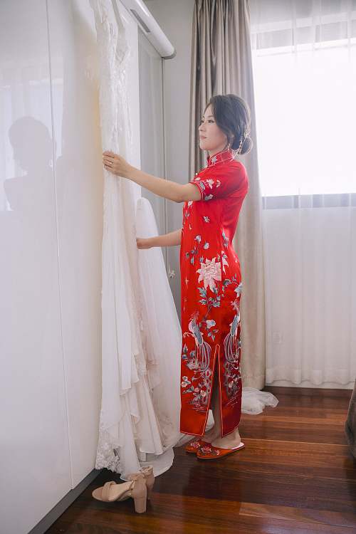 Chinese bride getting ready for traditional tea ceremony