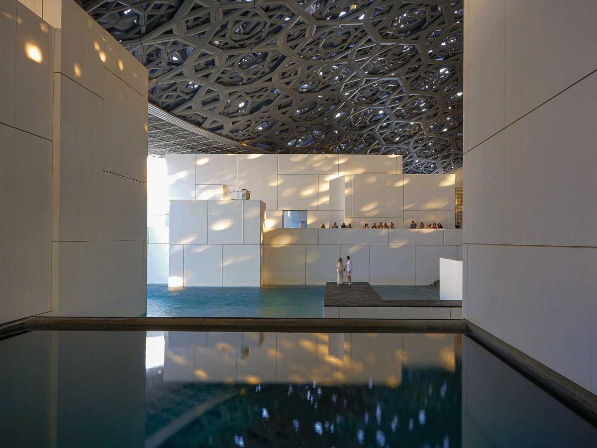 louvre abu dhabi reflections water architecture photography