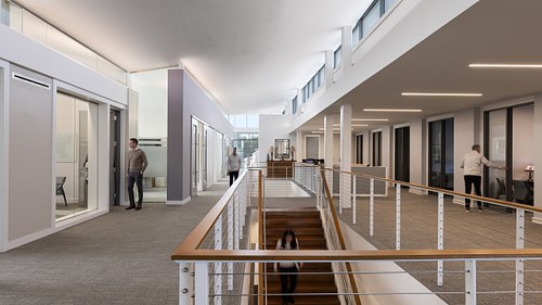 Wide-angle view of the modern communal corridor at FPU headquarters.