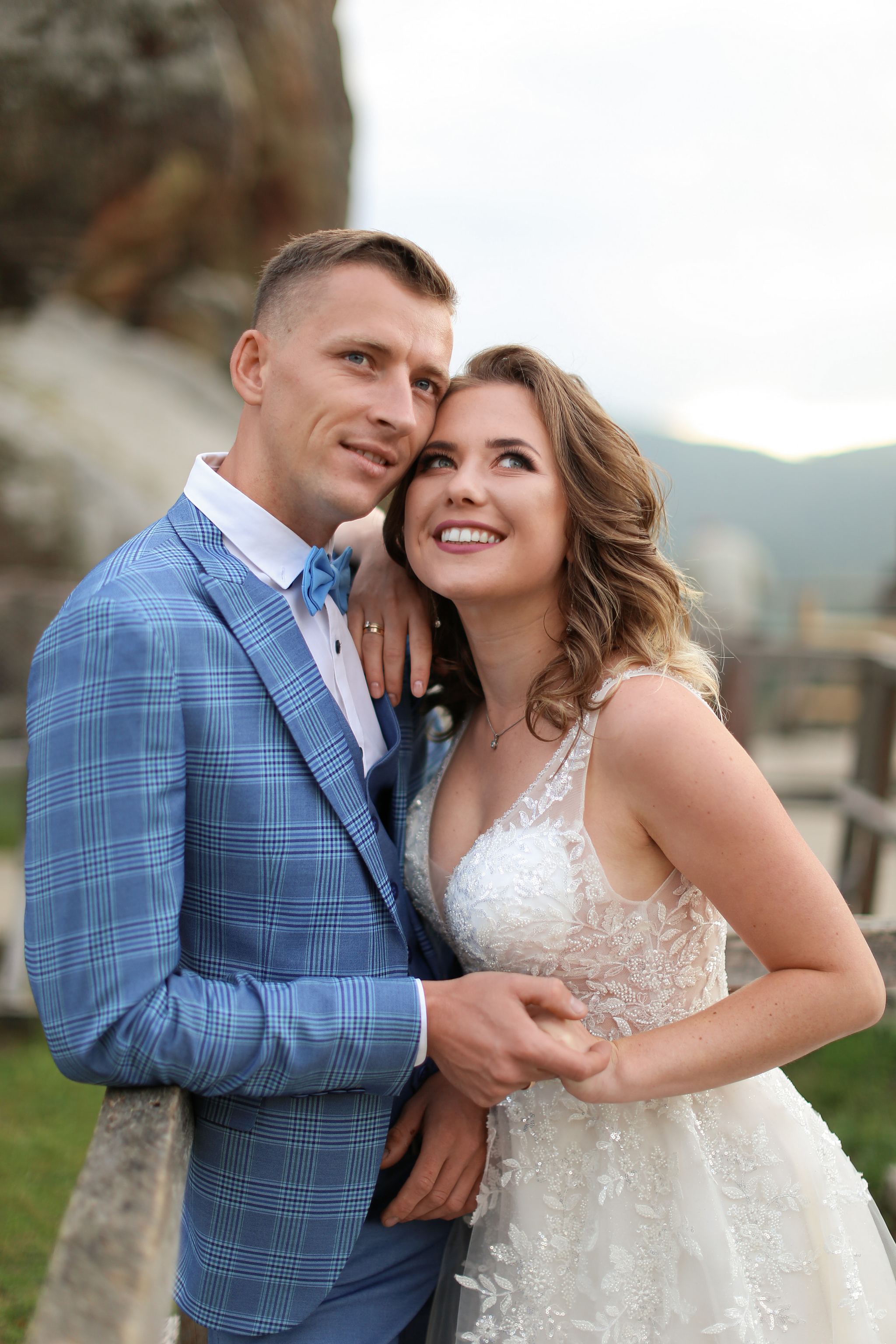 Bride and groom embracing during their Tustan Fortress wedding in Ukraine