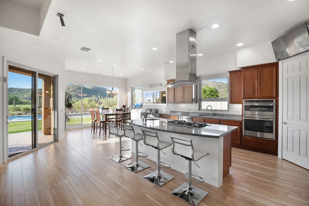 Modern kitchen with floor to ceiling windows in a Boulder Colorado home