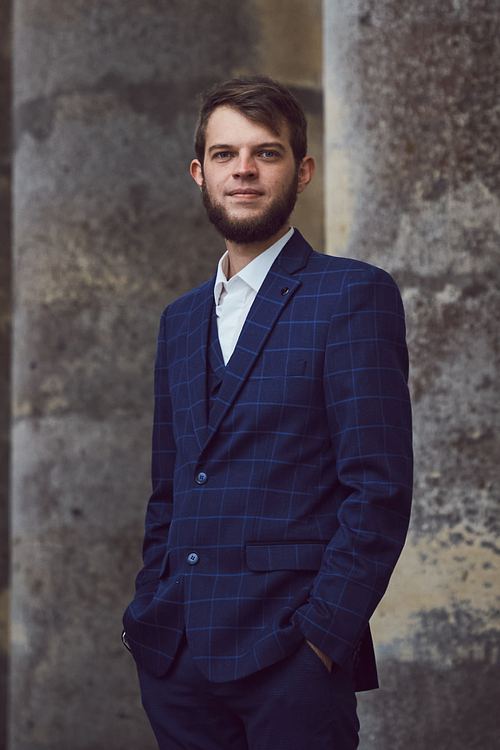 Groom portrait at St Joseph’s Church in Pidhirtsi