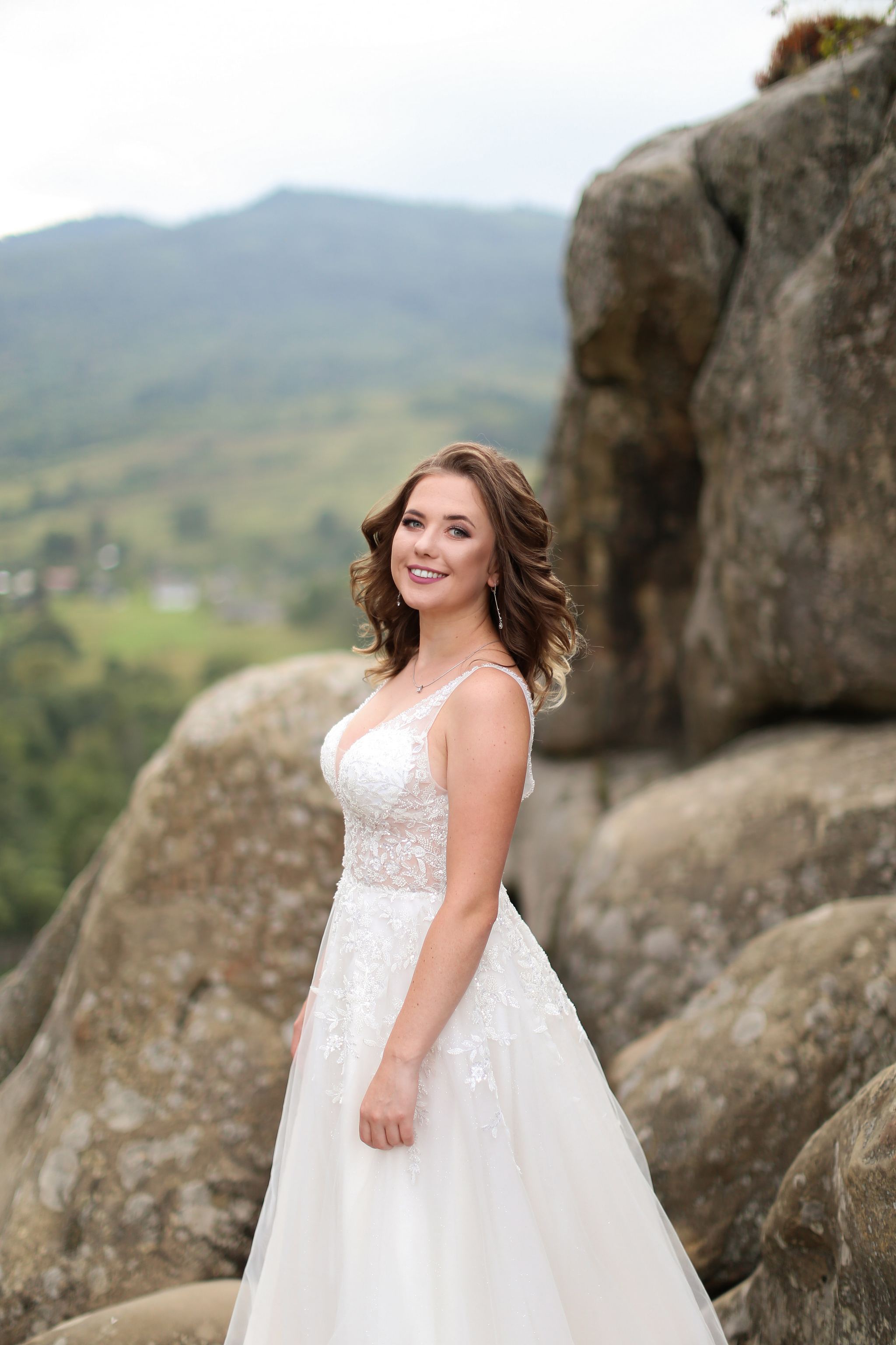 Bride portrait among the rocks at Tustan Fortress, Ukraine