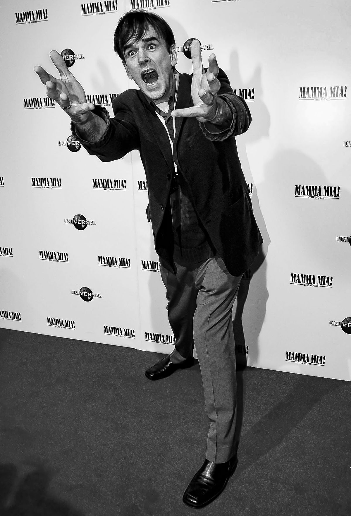 Tim Ferguson arrives on the red carpet for the National premier of Mamma Mia the Movie.