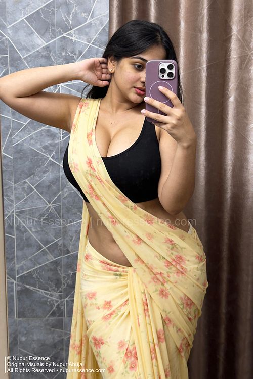 Indian fashion portrait featuring Nupur Ahuja in a floral saree