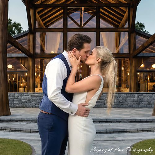 Bride and groom embracing in front of The Barn at Cottonwood Ranch near Jacksonville, Florida