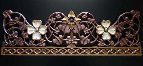 hand-carved crown with scrolling vines, dogwood flowers and virgin's bower by Wes Baker and painted by Kelly Baker