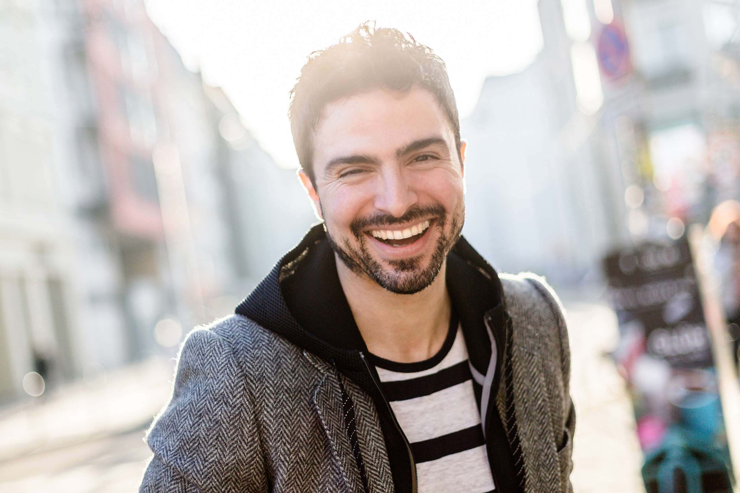 A portrait of actor Toni Gojanovic on a sunny day in Berlin.