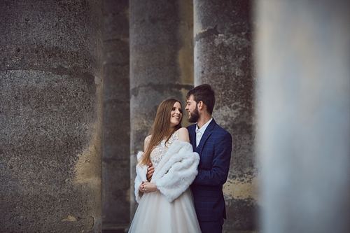 Bride and groom at St. Joseph’s Church in Pidhirtsi, Ukraine