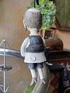 Traditional boy with a fish, little ceramic hanging sculpture