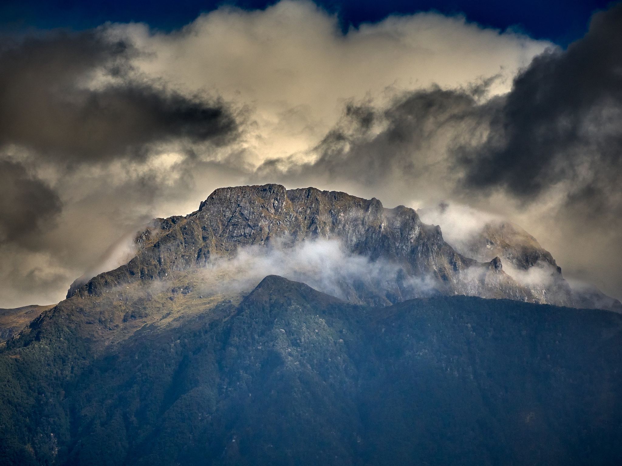 Sunlit Peak Above Lake Manapouri - Southland, New Zealand