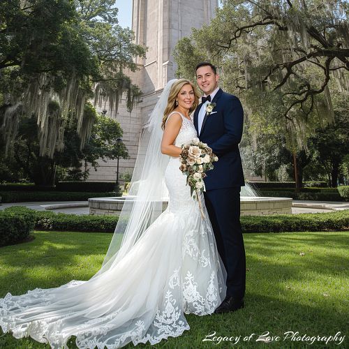 Couple's Bok Tower Wedding under mossy oak trees by Legacy of Love Photography.