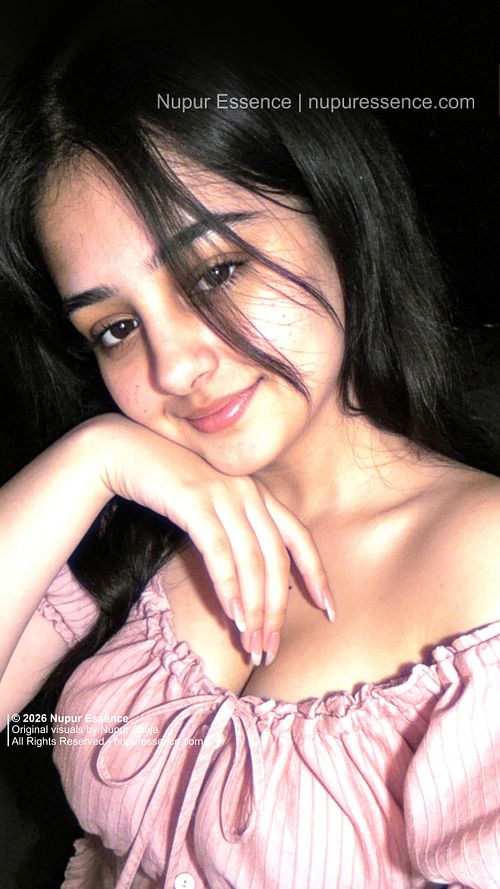 Nupur Ahuja for Nupur Essence wearing a pink off-shoulder top in a close-up portrait