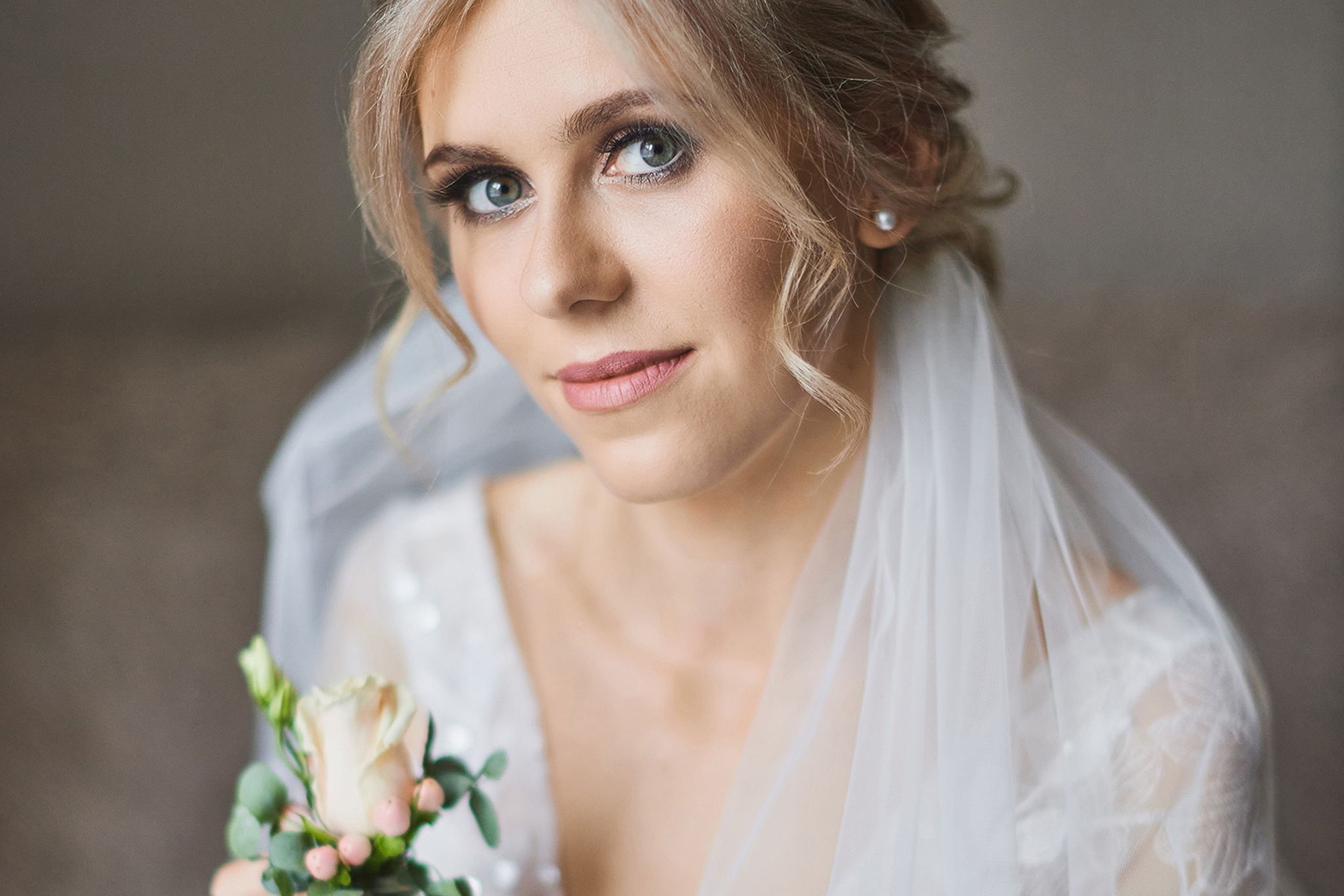 Bridal portrait with soft natural light and white veil