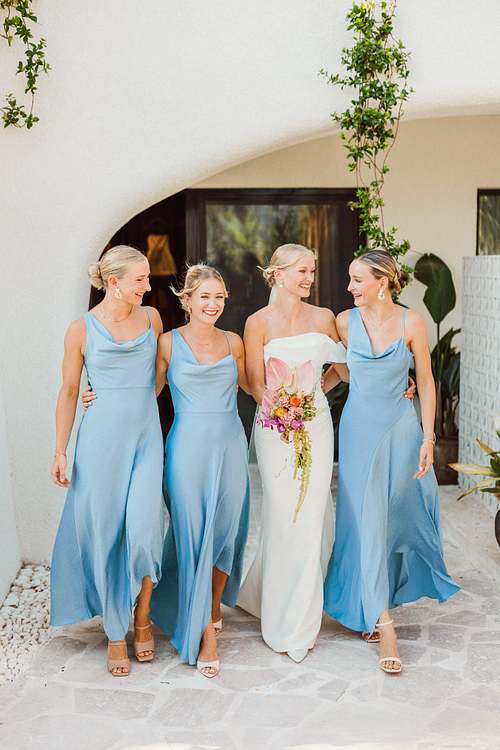 Bridesmaids in blue dresses at a Yalikavak wedding