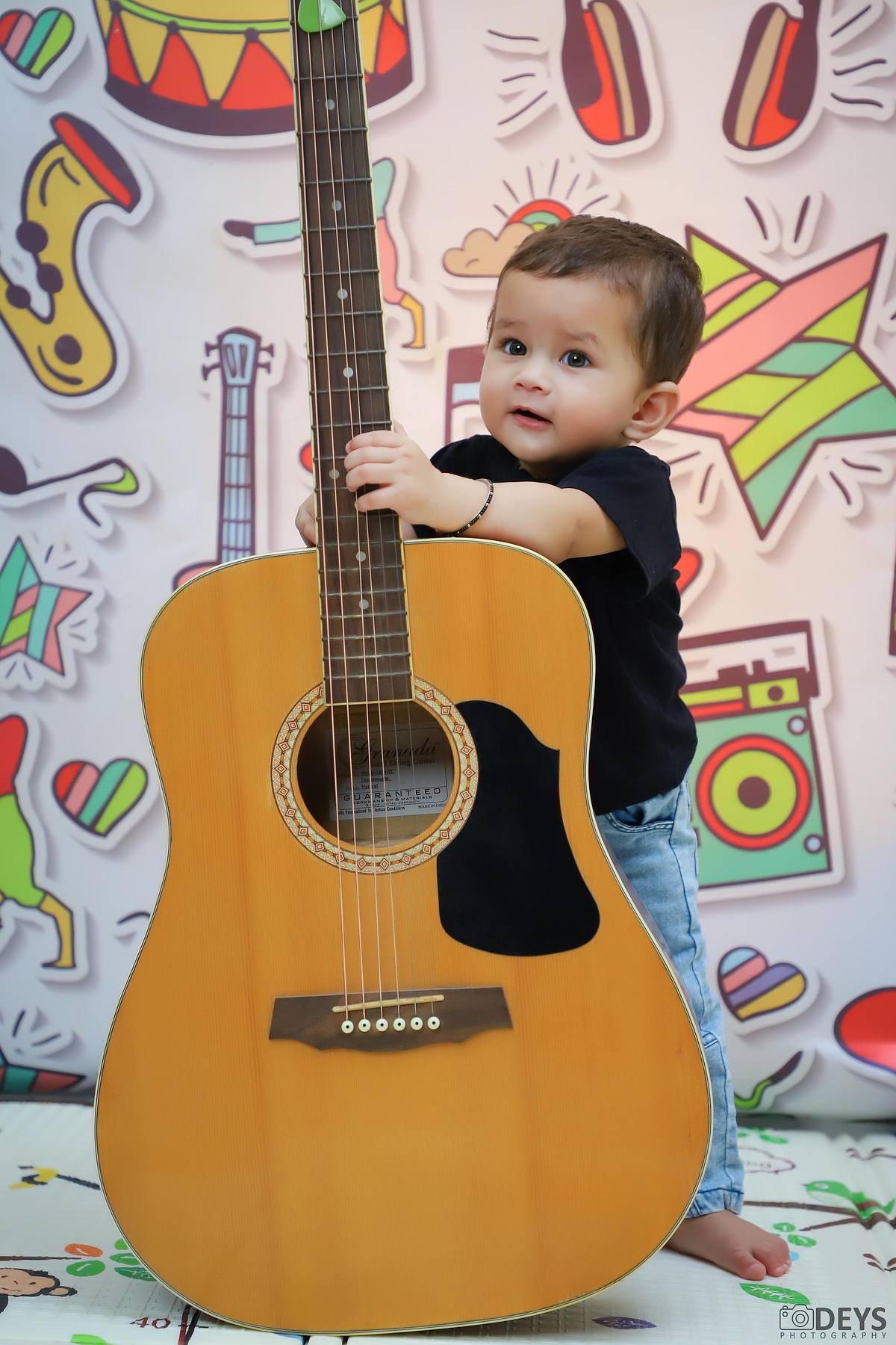 Photoshoot 1st birthday indoor in Noida music theme