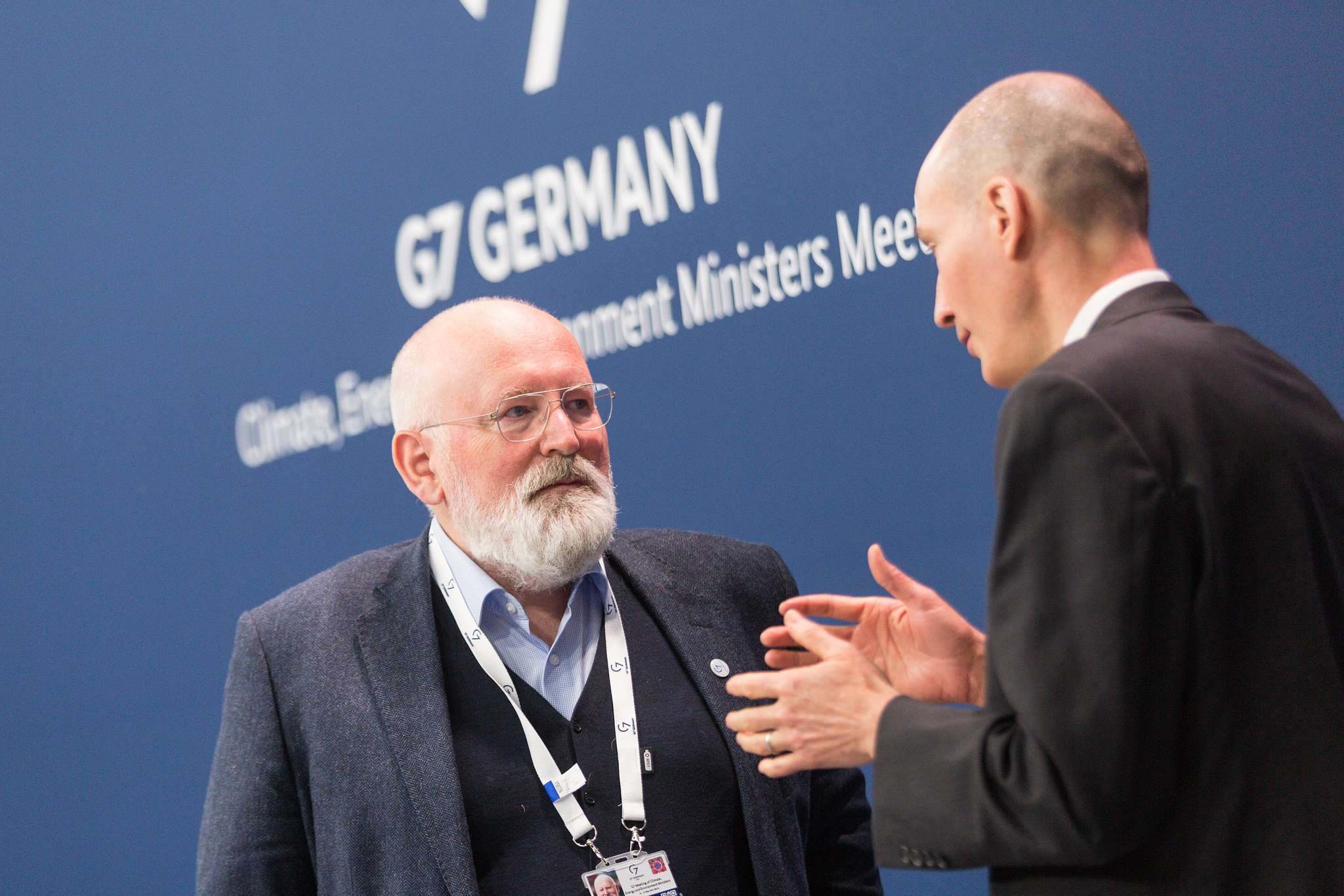 Frans Timmermans and David M. Turk talking at G7 Ministerial Meeting in Berlin.