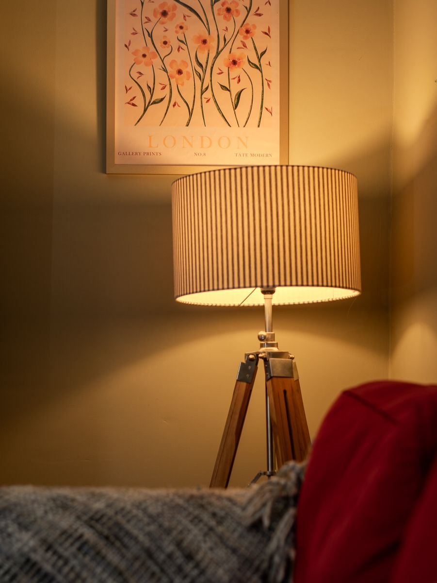 Table lamp and interior detail in a holiday cottage