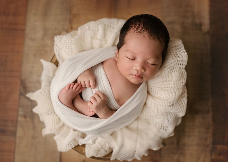 When should I book my newborn photographer?