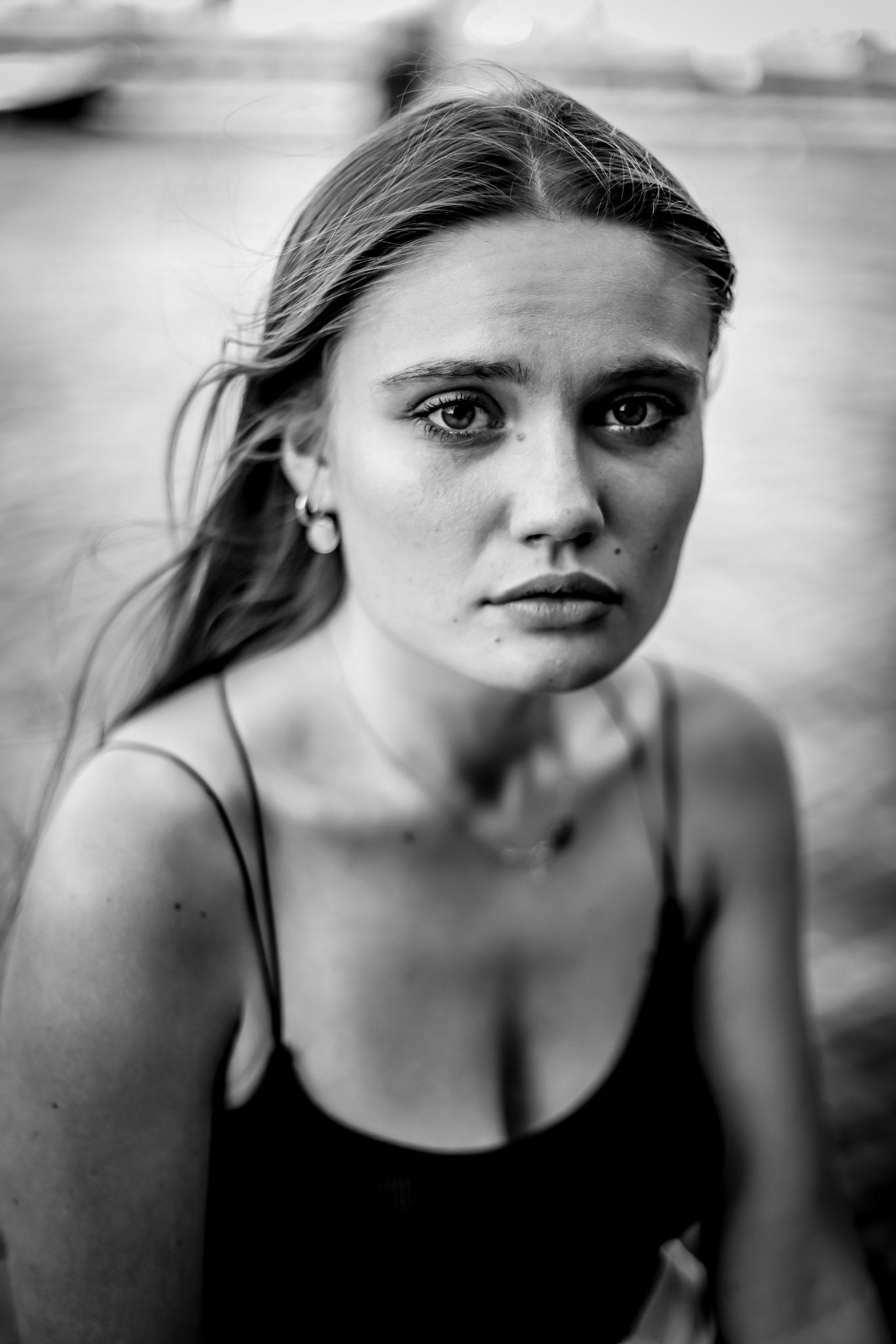 Close up melancholy black and white head shot portrait of polish model by copenhagen portrait photographer