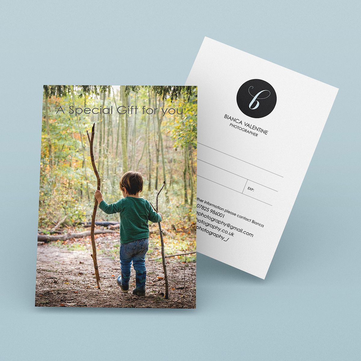 photographer gift voucher showing small boy walking through woods holding a wooden staff
