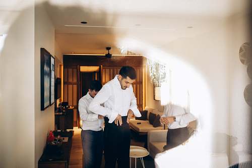 Groom preparing for his wedding at Avantgarde Refined