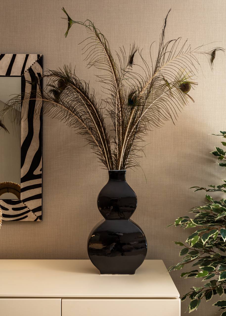 Fotografia de no Apartamento Montijo, destacando a decora&ccedil;&atilde;o com Estilo Africano.