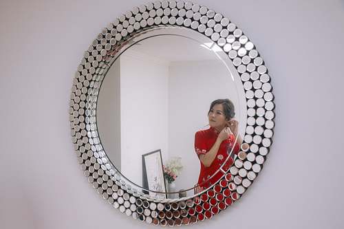 Chinese bride getting ready for traditional tea ceremony