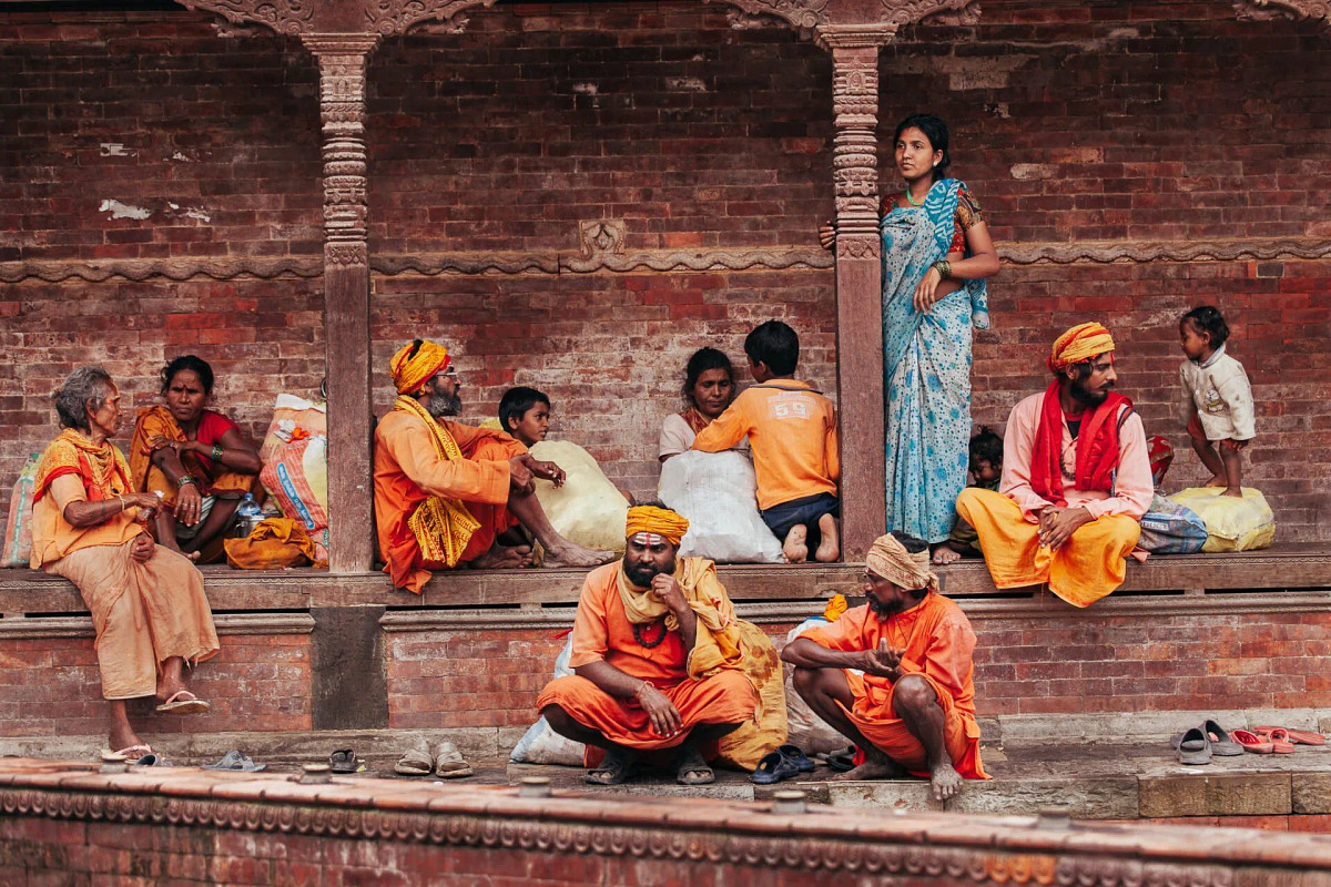 By using mostly warm tones across the image, the woman in blue pops as something different and immediately grabs the viewer's attention
