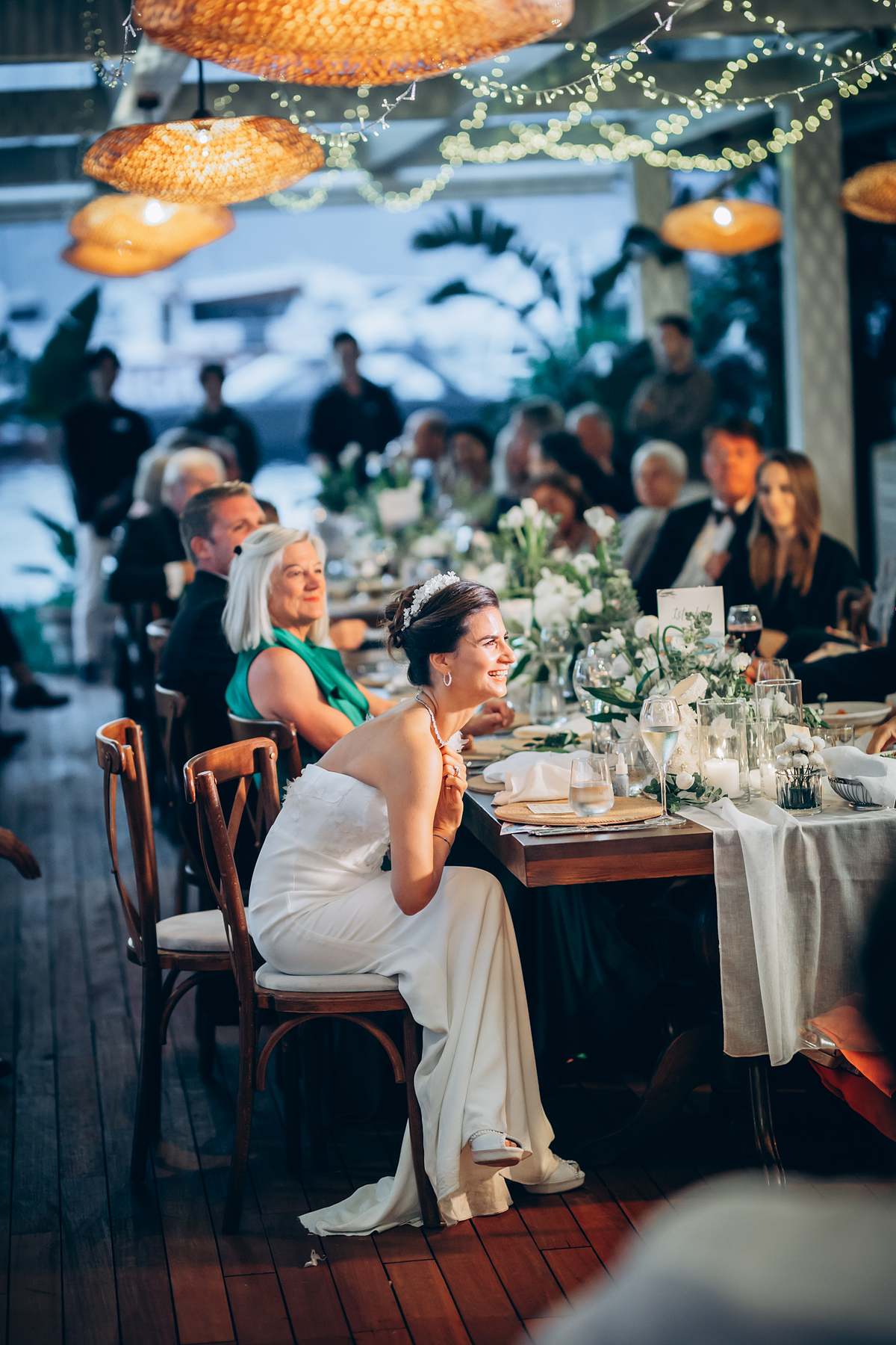 Bride laughing during the evening wedding reception at D-Resort Göcek