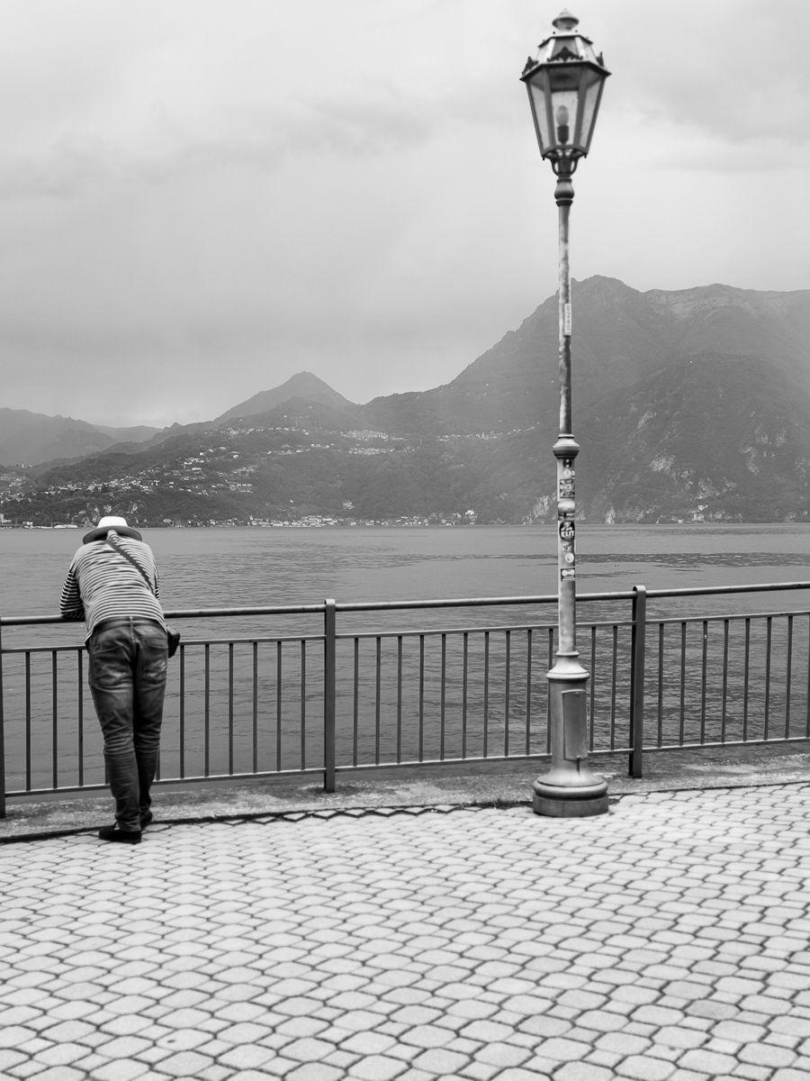 Scenic view of Lake Como in Italy surrounded by mountains and historic villages.