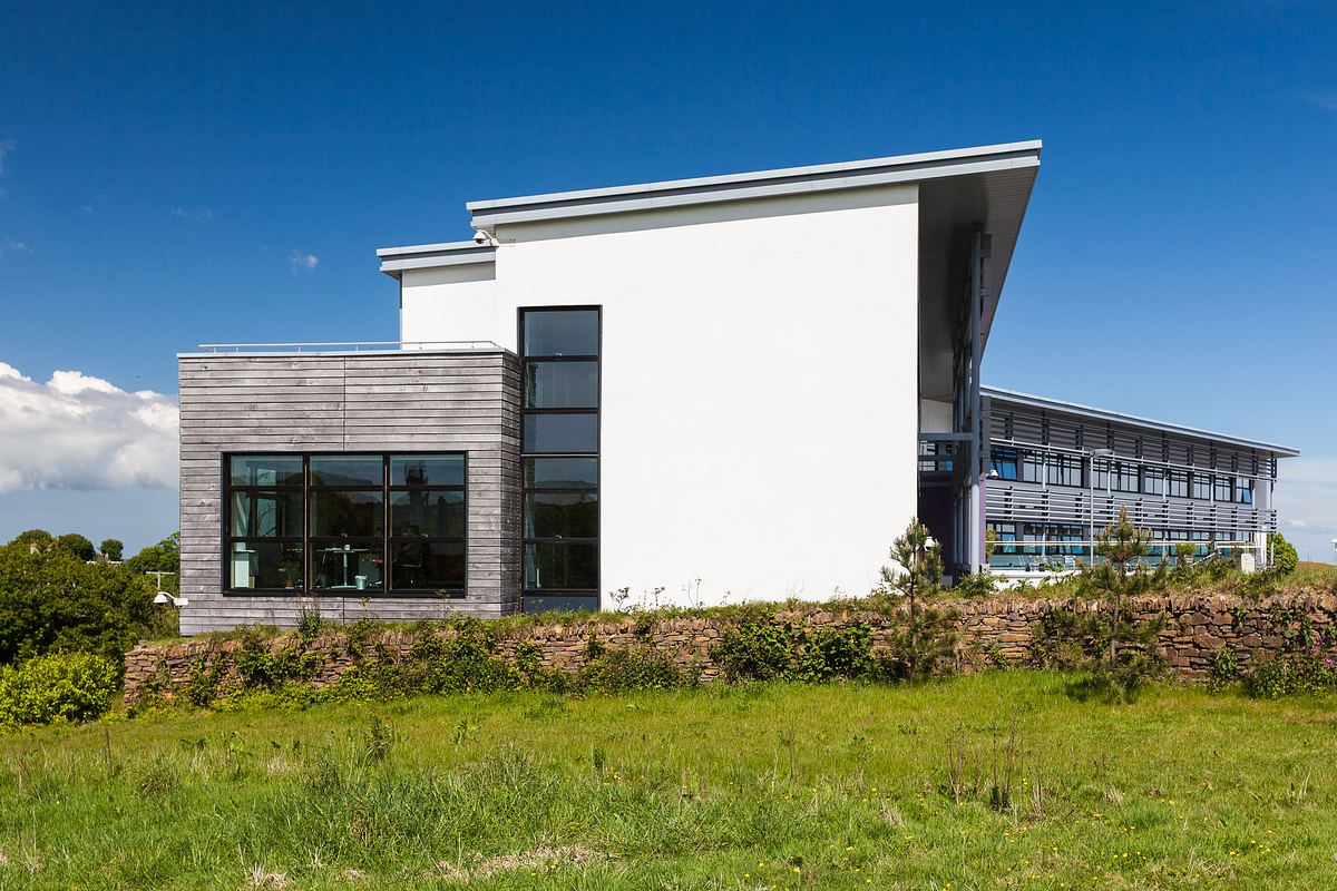 Cornwall architecture photography of Tremough Innovation Centre showing countryside setting and modern façade.