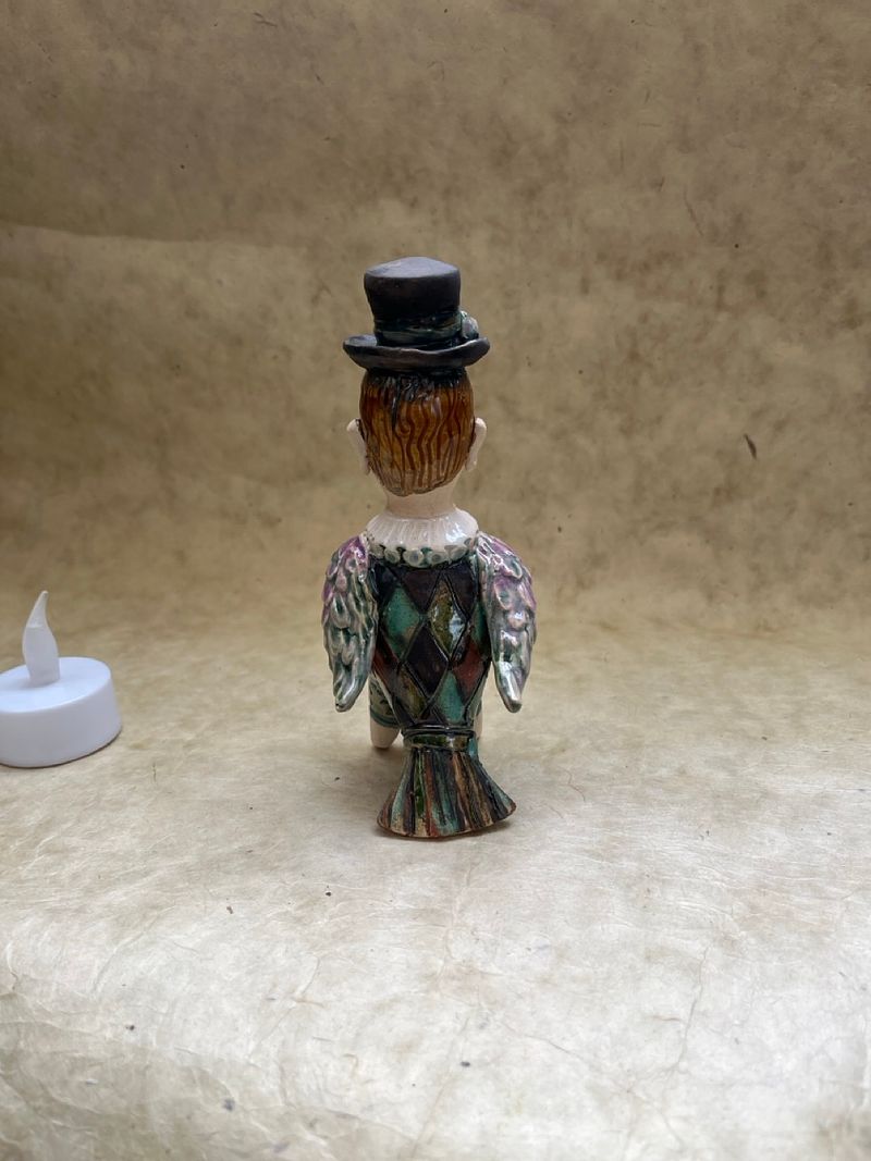 Spring bird with hat, ceramic mini-sculpture