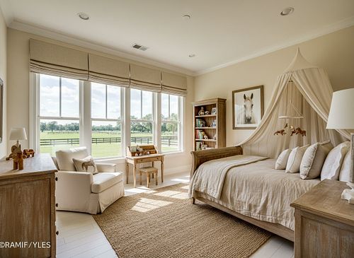Professional real estate photography of a sun-lit master bedroom with neutral decor and large windows in Gainesville FL by PrimePropertyPhoto.