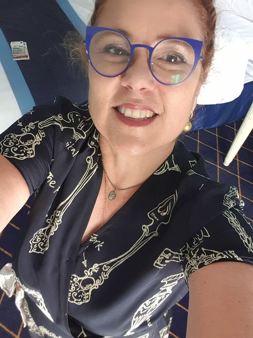 I'm Marina Rafael, a mural artist, illustrator, and painter specializing in custom wall murals that transform homes, businesses, schools, and public spaces into unique works of art.