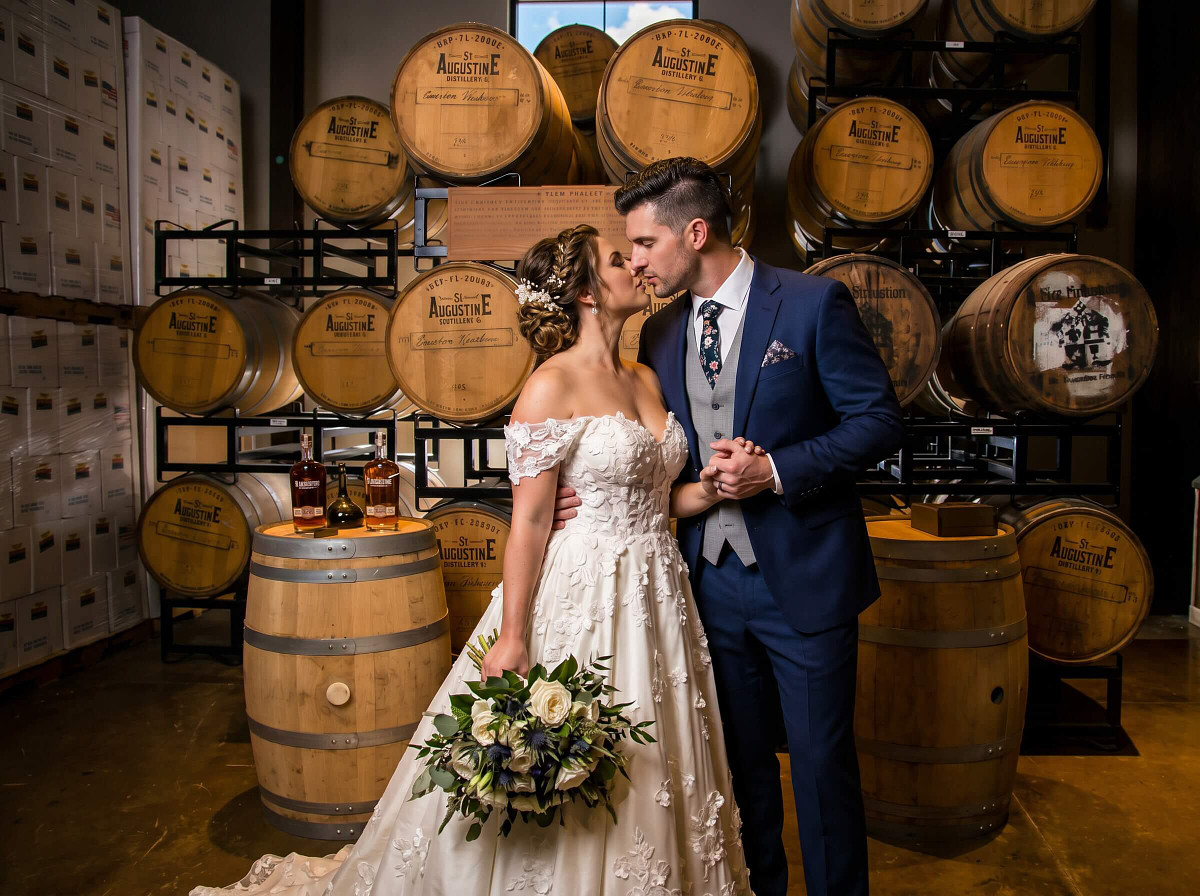 Bride and groom sharing a kiss at St. Augustine Distillery, captured by Legacy of Love Photography, St. Augustine wedding photographer.
