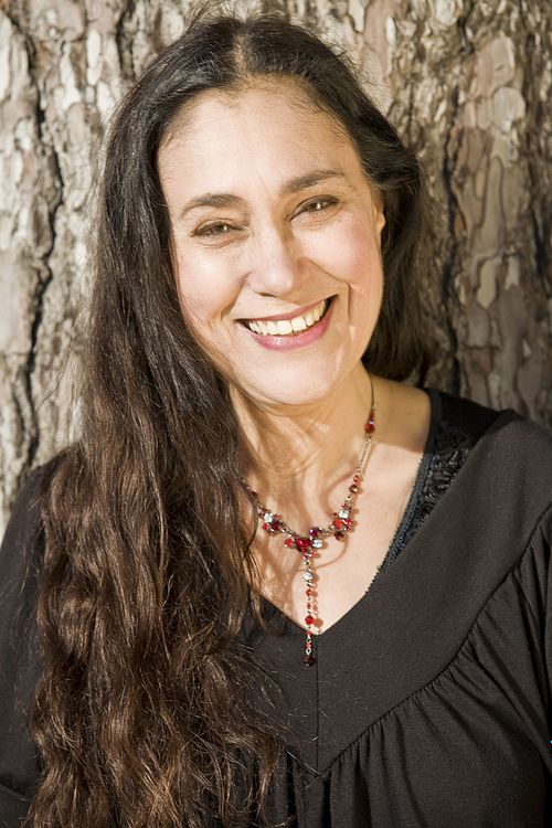 Portrait of Myriam Birger in Central Park, New York, in a natural outdoor setting