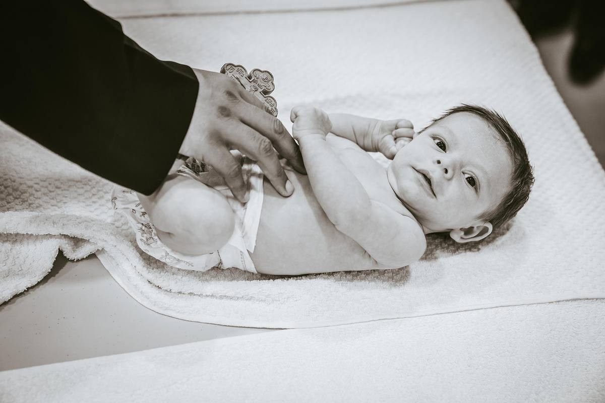 baby baptism ceremony at Ottawa church captured by Kameel Photography