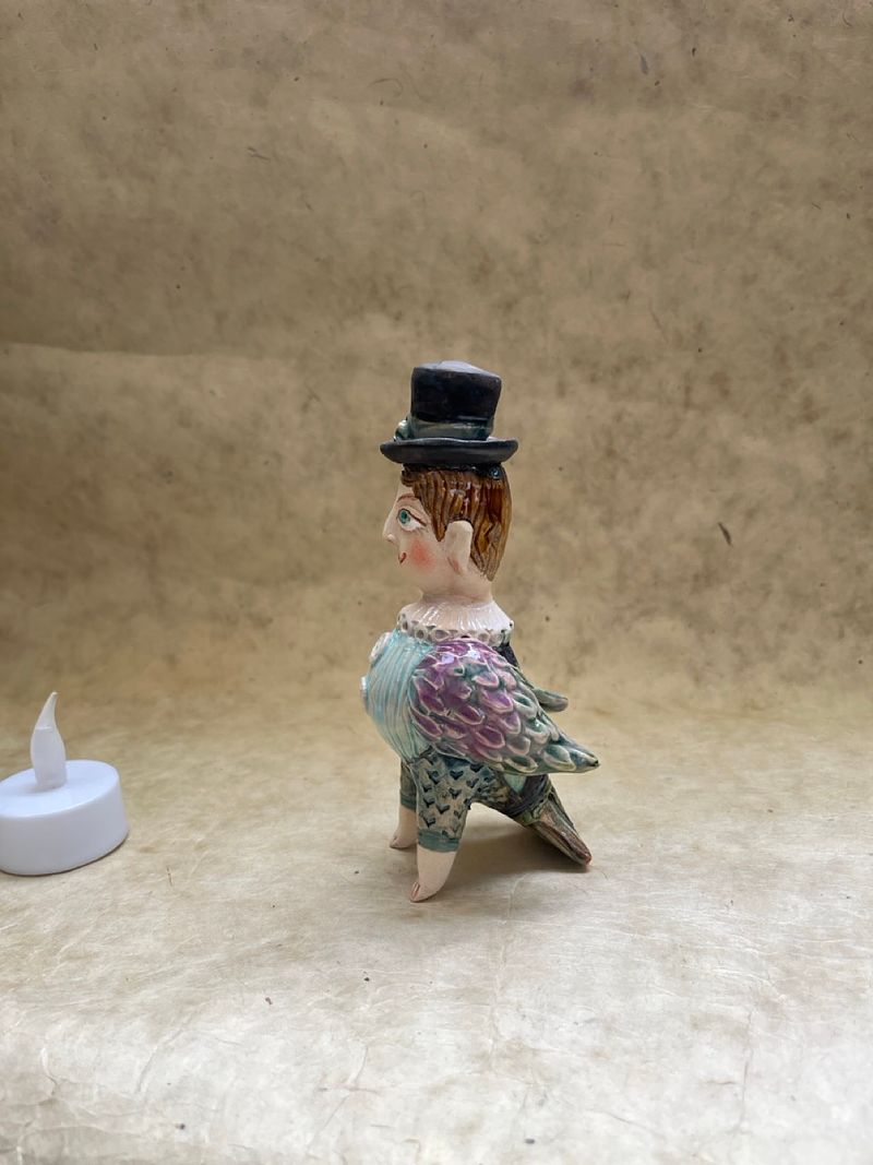 Spring bird with hat, ceramic mini-sculpture