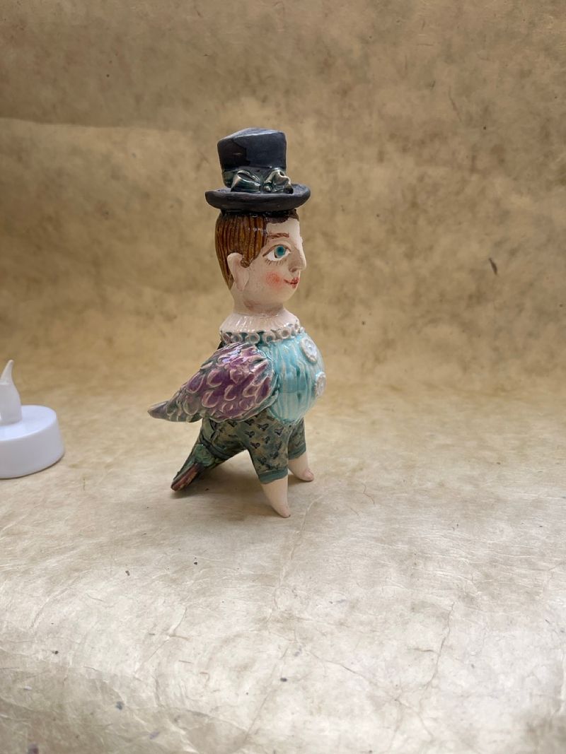 Spring bird with hat, ceramic mini-sculpture