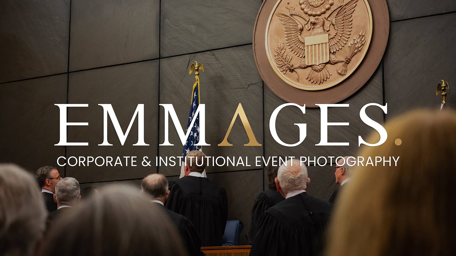Federal judicial ceremony with judges standing beneath the U.S. seal in a courtroom photographed by Philadelphia event photographer Emmages