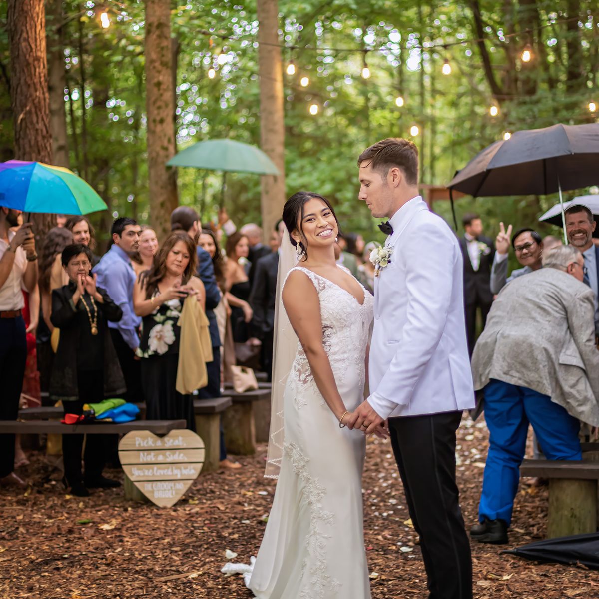 kylan barn unplugged wedding ceremony in the woods during a rainy day