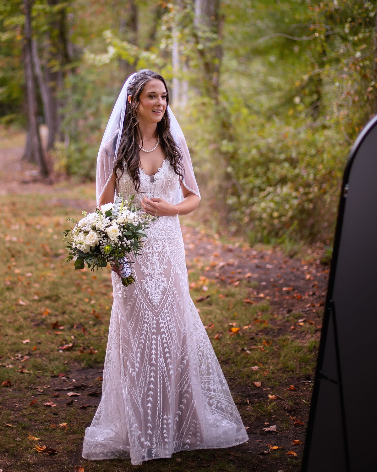 bride looking in the mirror before the wedding ceremony on a farmstead on the eastern shore