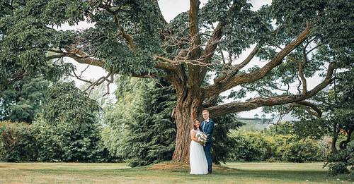 Wedding session in Ottawa — couple laughing together in a park setting